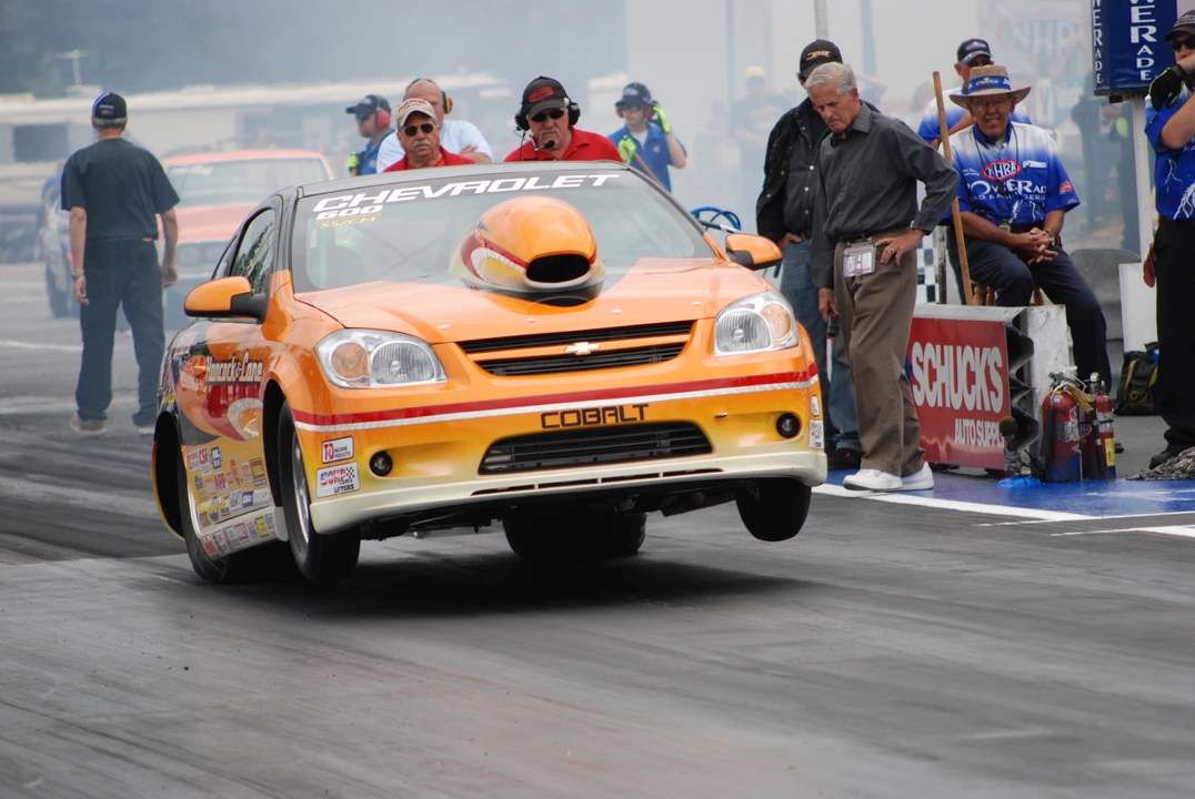What are the pros and cons of drag racing an AWD car?